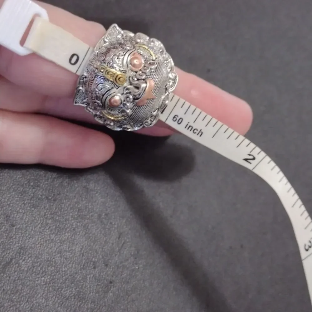 Silver tone ring looks like a tribal animal size 7